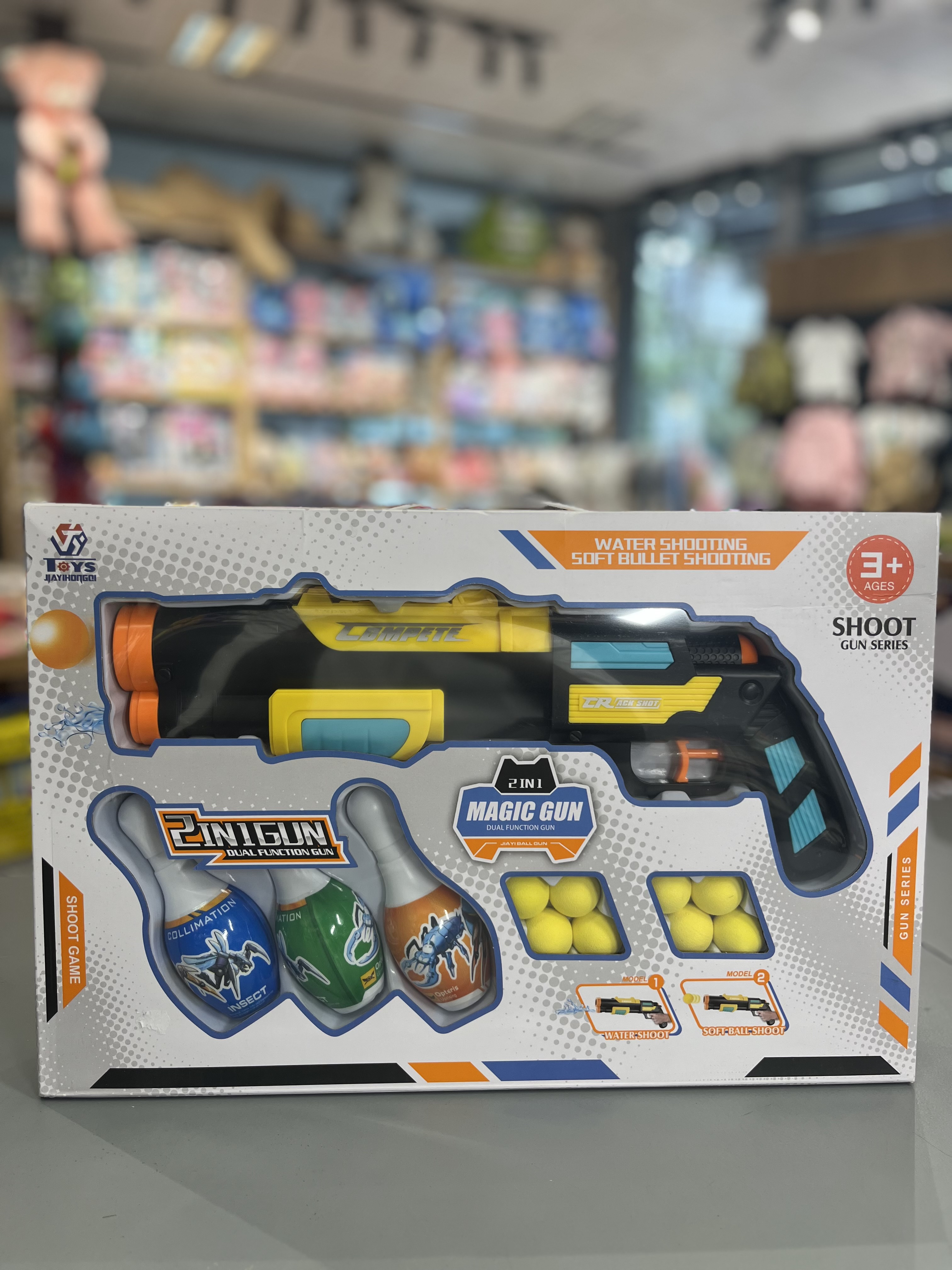 تفنگ اسباب‌بازی دوکاره مجیک گان – تیراندازی آب و گلوله اسفنجی (Magic Gun 2in1
